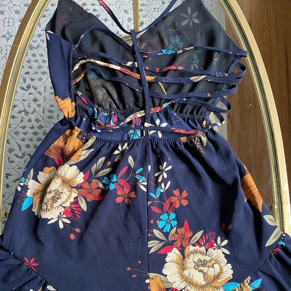 Floral Summer Romper with Ruffle bottom and Criss cross back - Picture 5 of 8